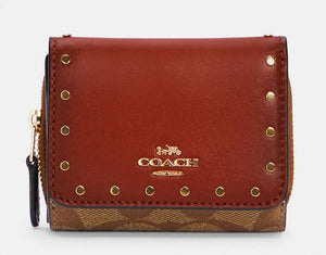 Coach Small Trifold Wallet In Colorblock Signature Canvas With Rivets