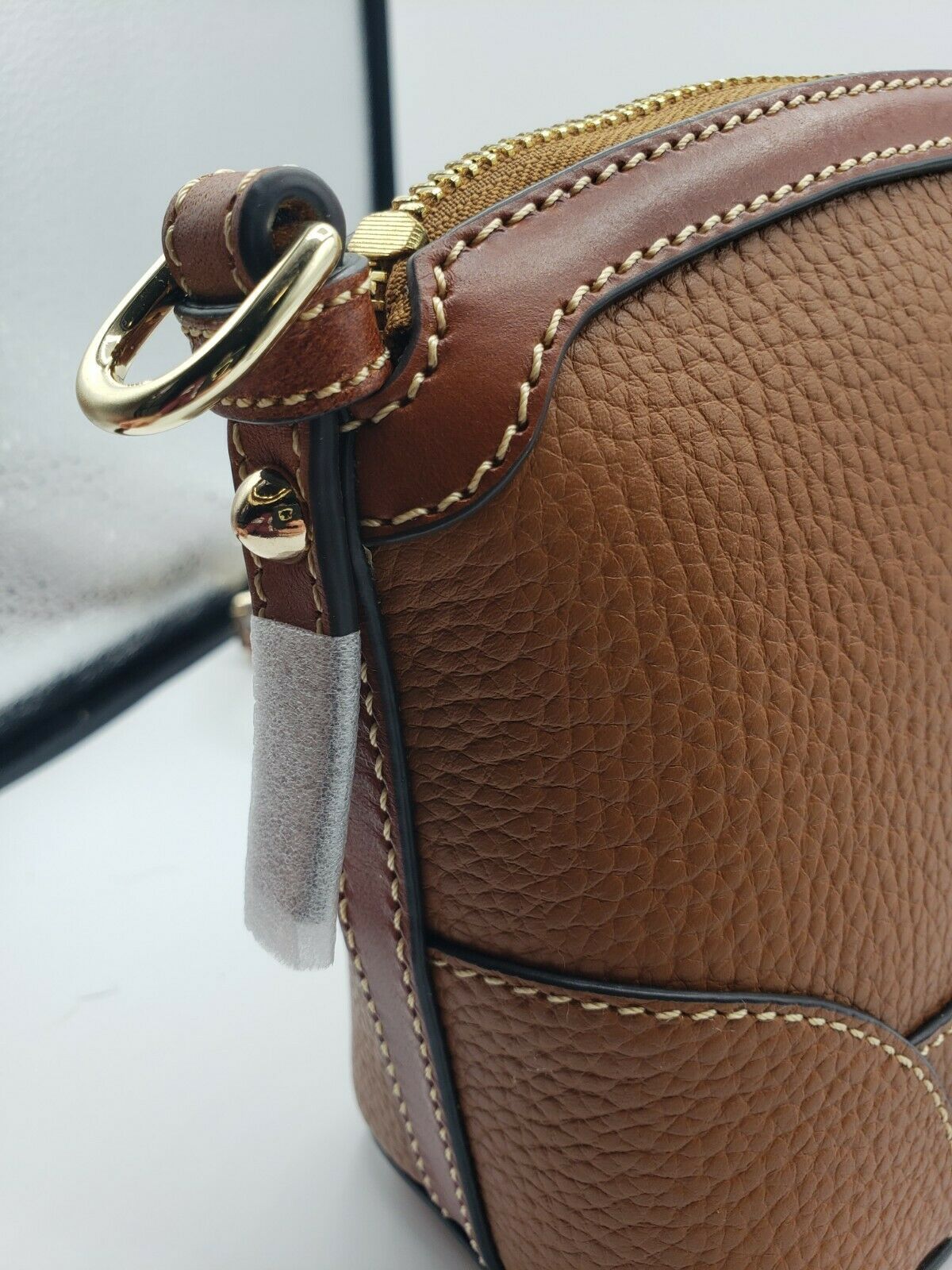 D & B PEBBLE GRAIN MINI DOMED CROSSBODY